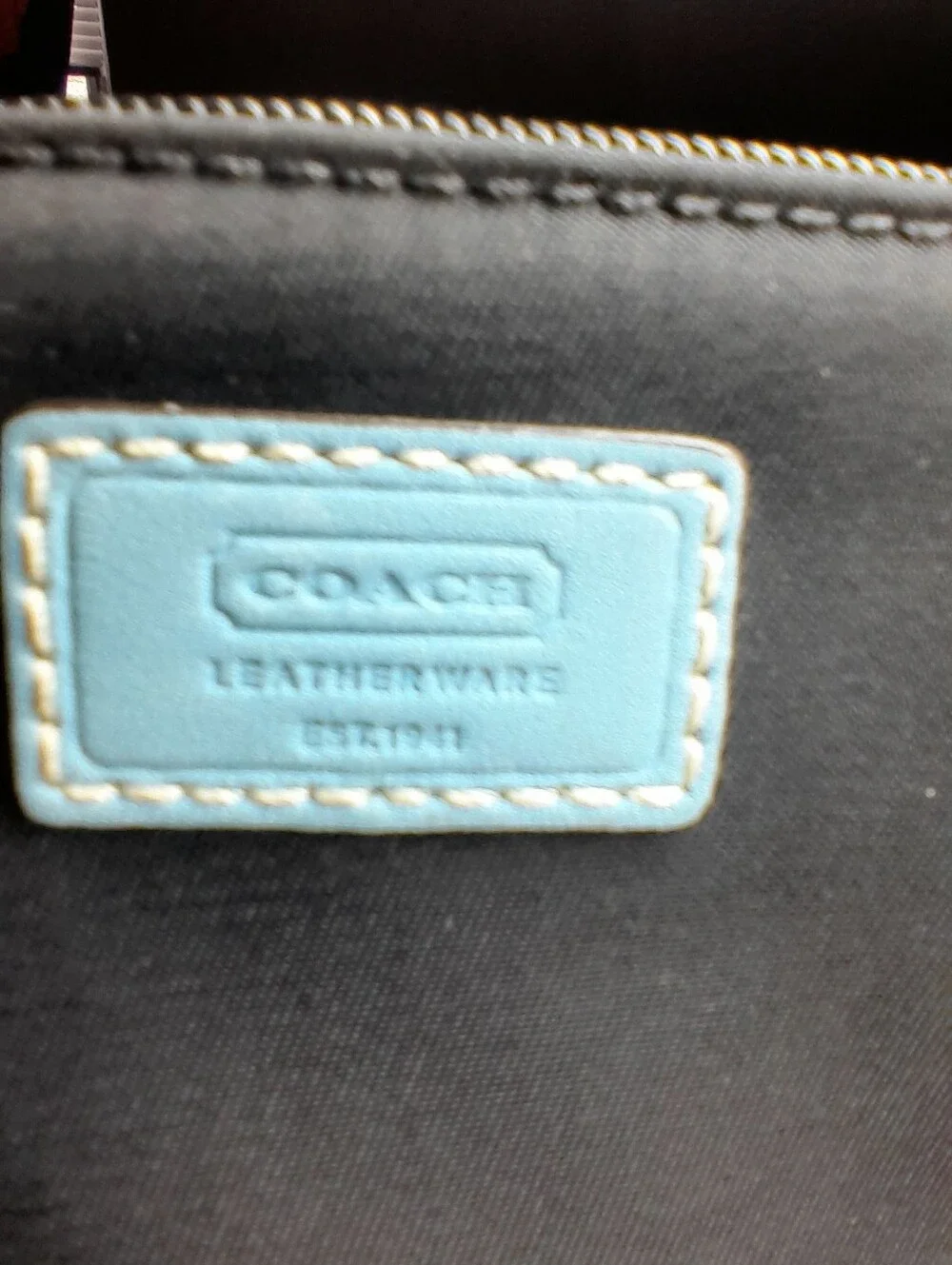 Black Wristlet Clutch with Light Blue Accents